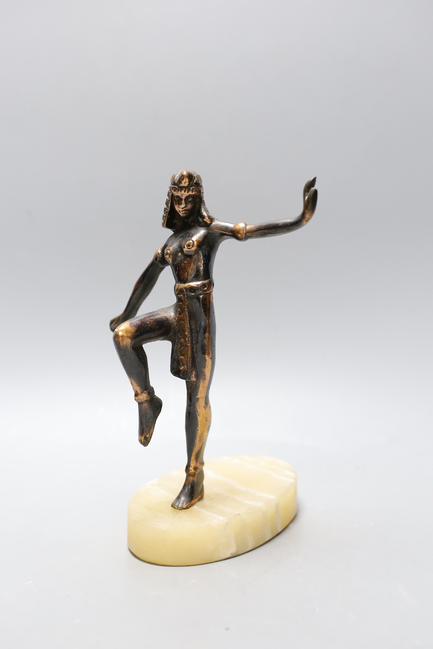 A miscellaneous selection of items, to include a Mappin and Webb Peugeot grinder, an Egyptian-style lady dancing on a plinth, a beaded dagger, etc.